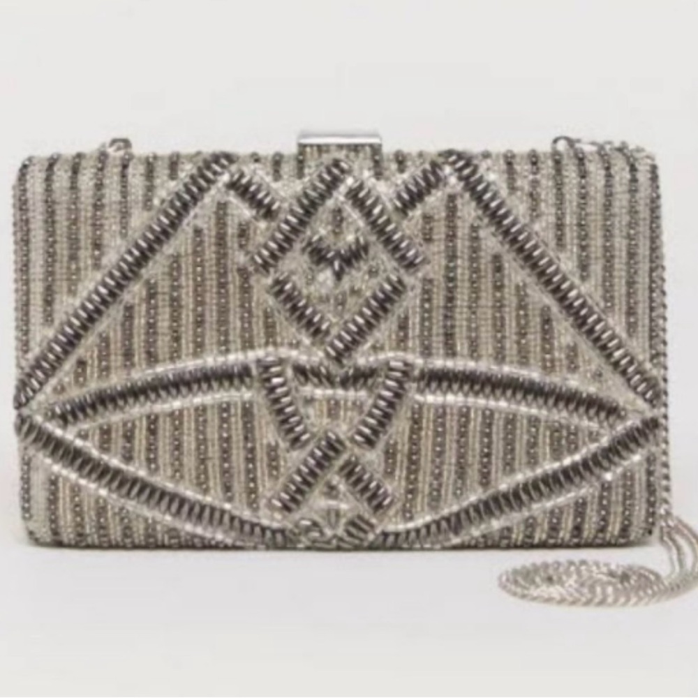 Roller Rabbit Viti Hand
Embroidered Clutch